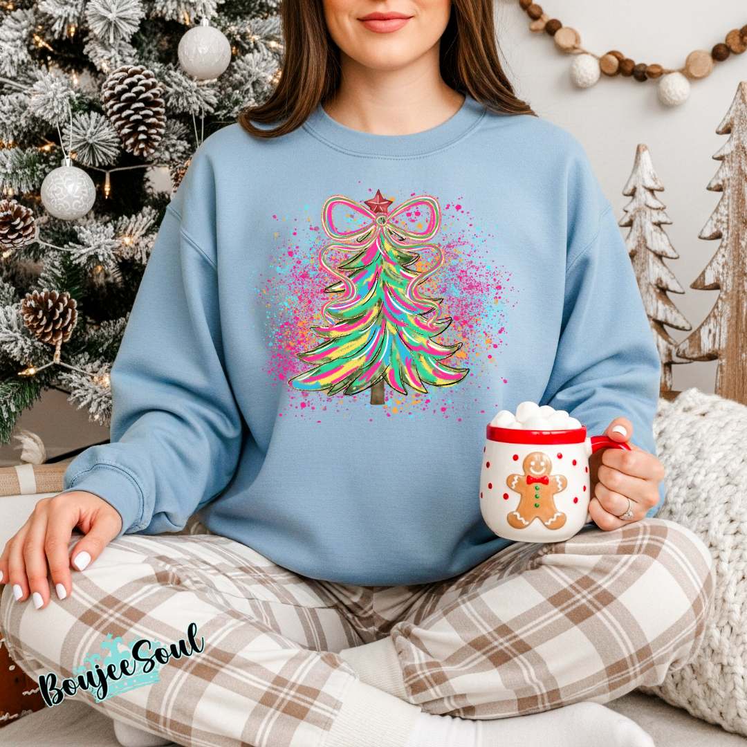 Colorful artistic Christmas tree sweatshirt with bright holiday paint splashes