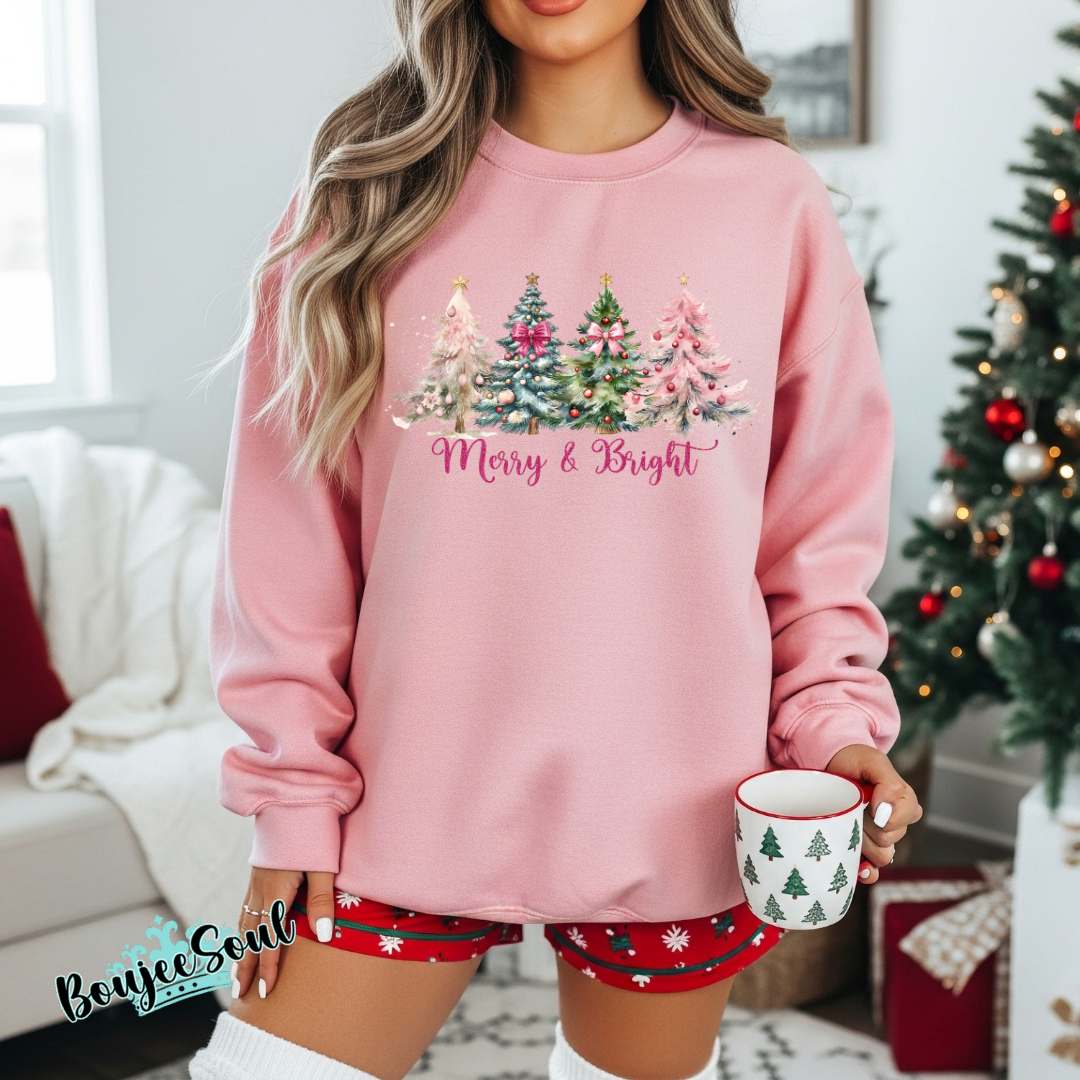 Pink Merry & Bright Christmas Sweatshirt with pastel holiday trees design.