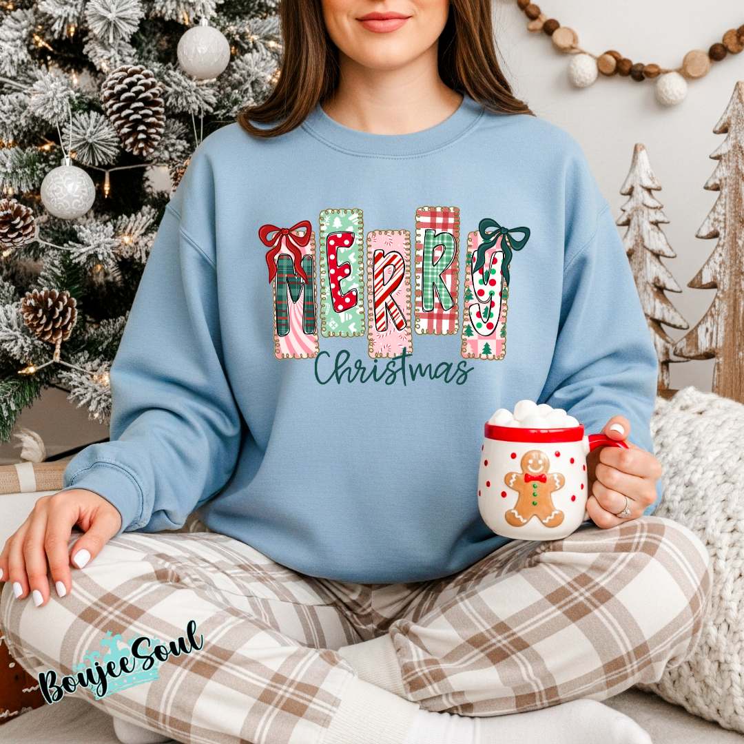 Merry Christmas sweatshirt with colorful patchwork-style holiday lettering.  Cute festive sweatshirt for women, perfect for Christmas 2025