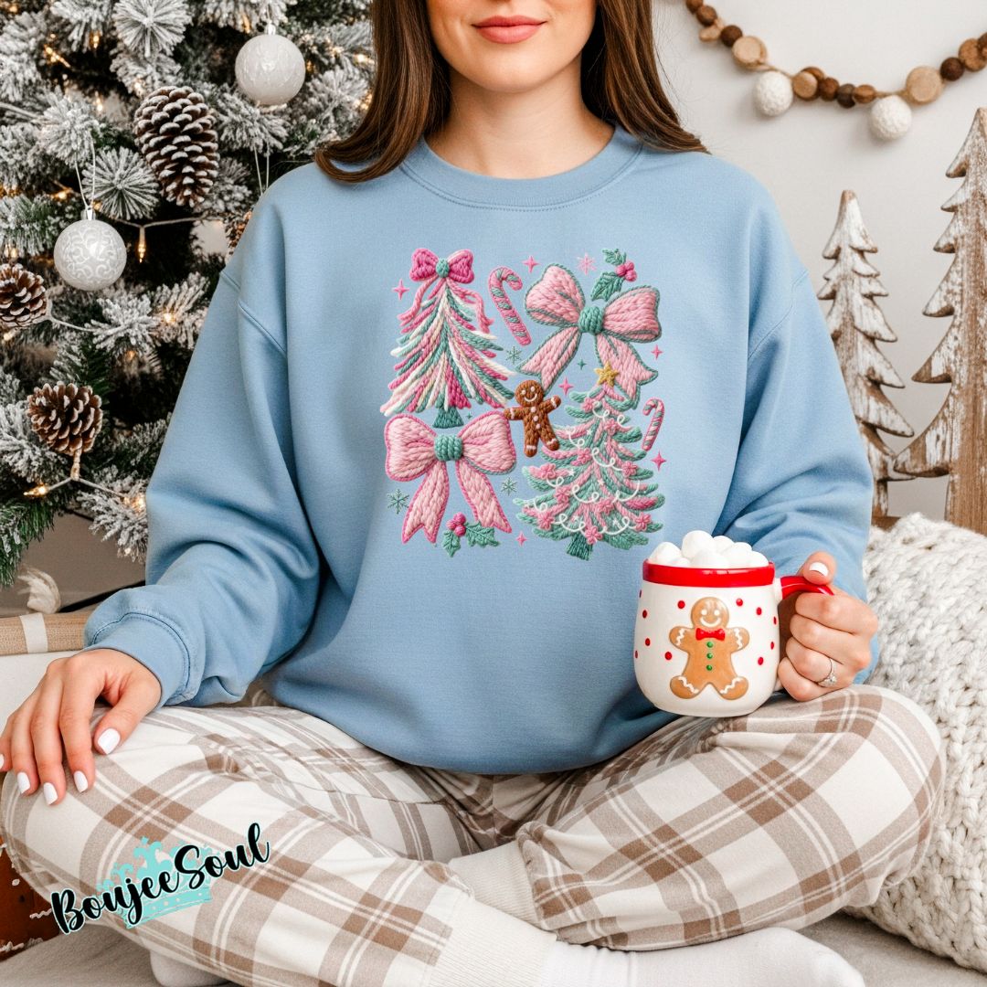 Pastel faux-crochet Christmas sweatshirt with pink and min trees, bows, and gingerbread details.  Cute Holiday crewneck for women. Perfect for Christmas 2025